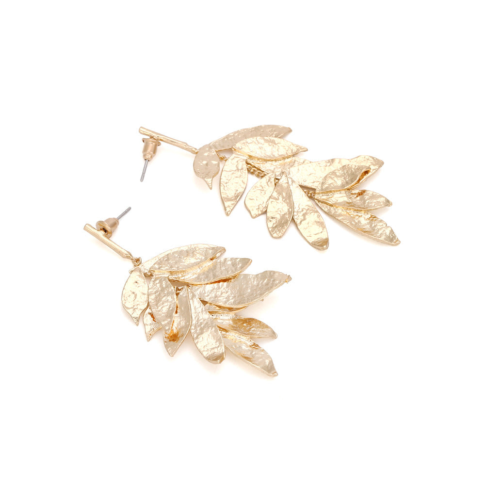 Asymmetrical leaf tassel earrings