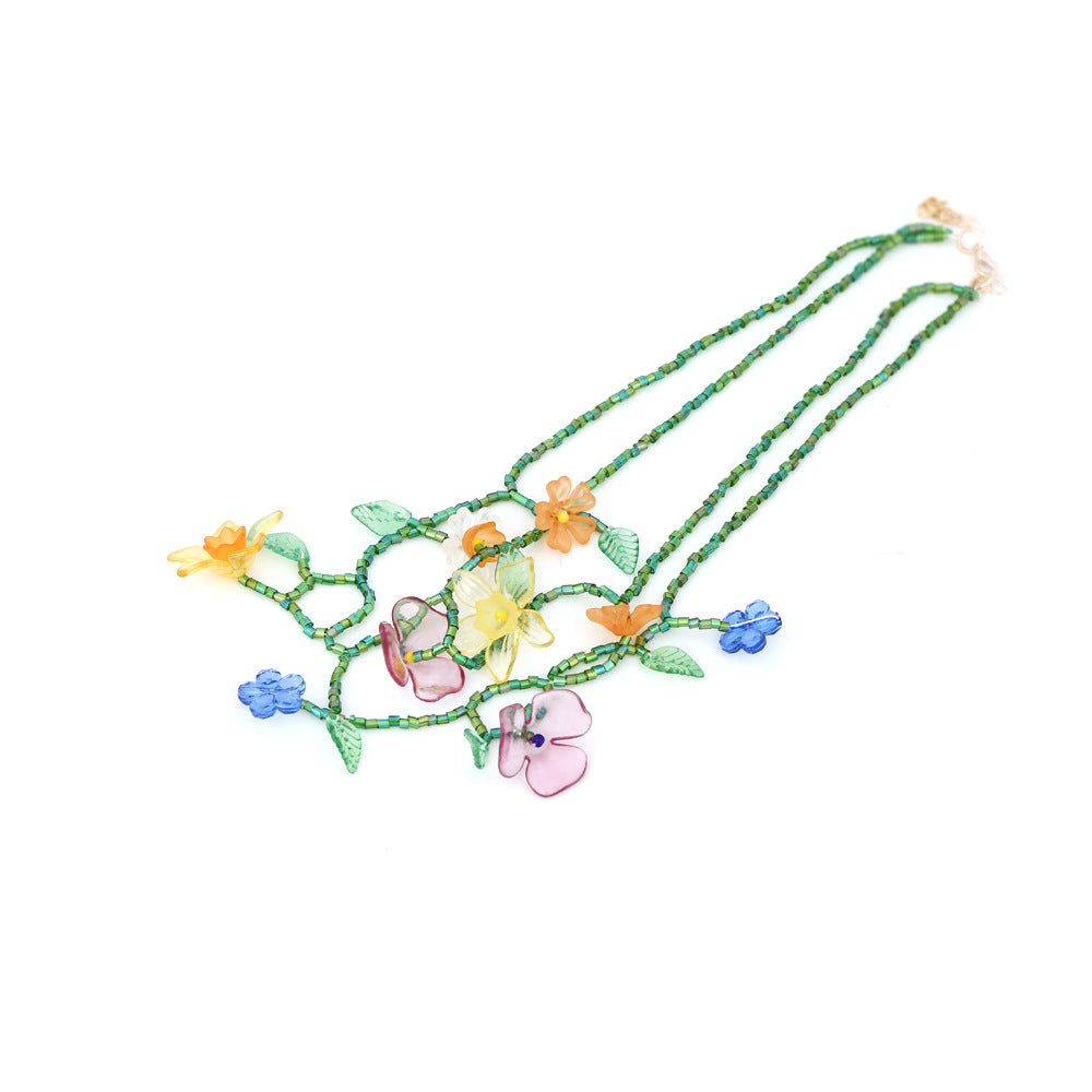 Multi-layered hand-woven floral clavicle chain