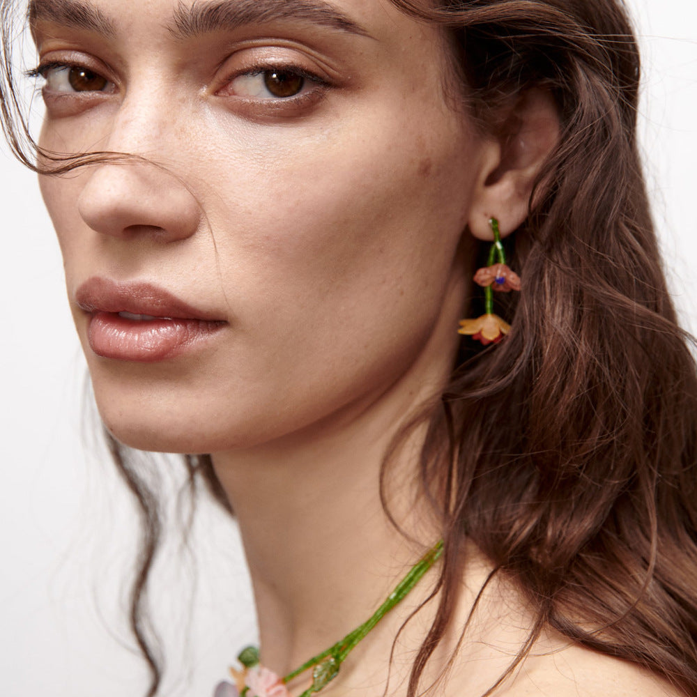 Minimalistic asymmetrical handwoven floral resin earrings