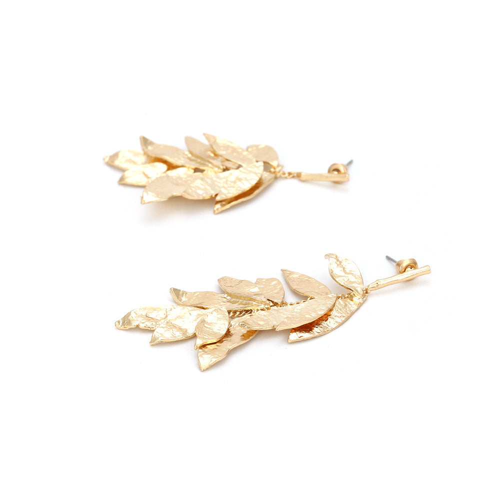 Asymmetrical leaf tassel earrings